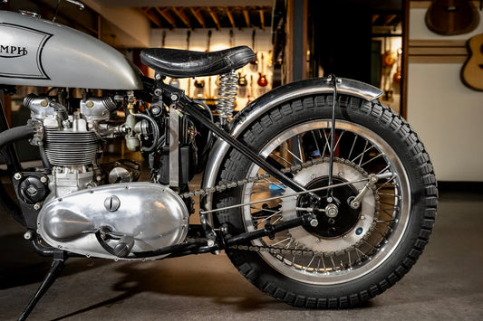 Close-up of a motorcycle in a showroom setting