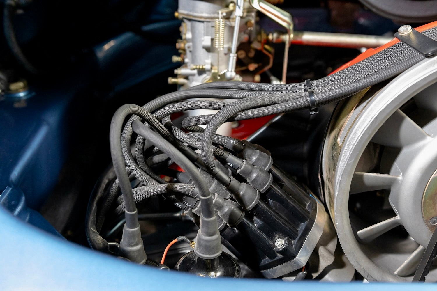Close-up of an engine with spark plugs and wiring