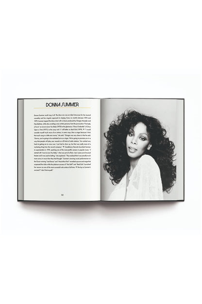 Open book with a black and white photo of a woman on one page and text on the other, on a white background.