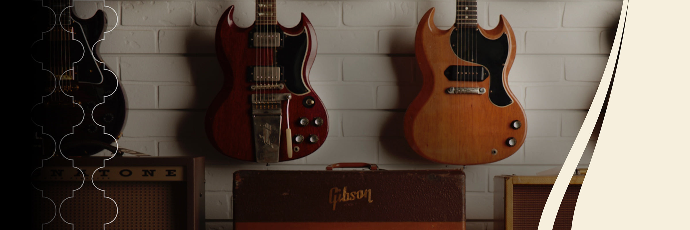 Gibson Guitars and amps on the wall at Walt Grace Vintage
