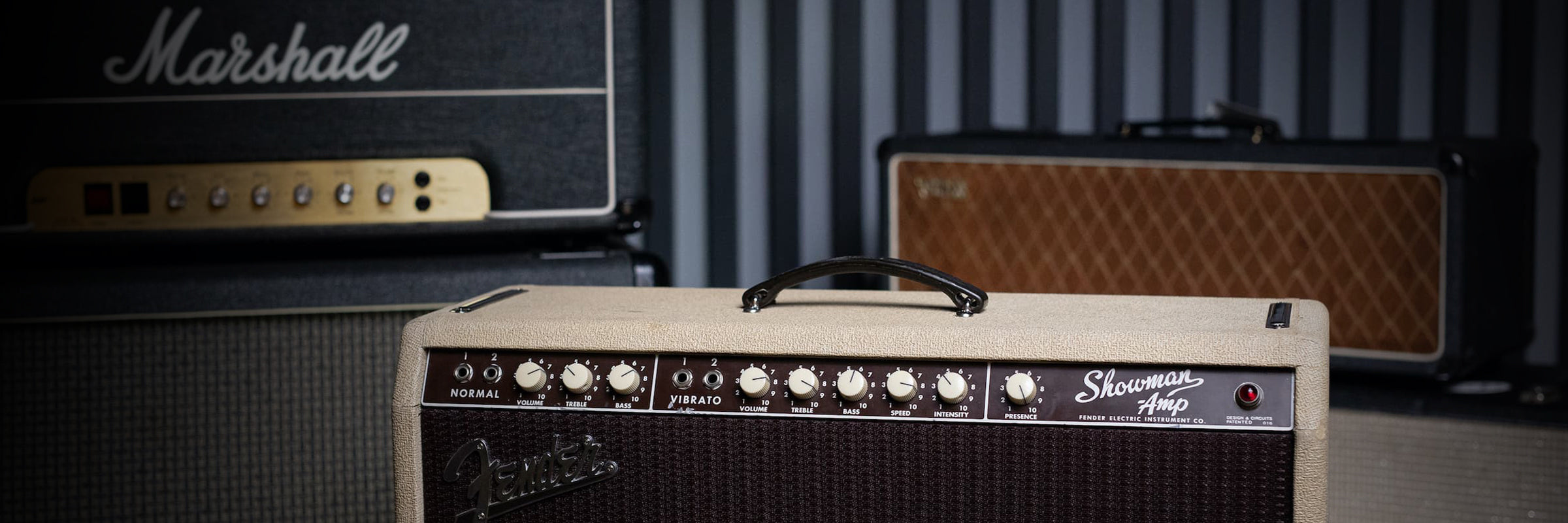 Marshall amplifier head with Fender Showman and Vox AC30 head at Walt Grace Vintage