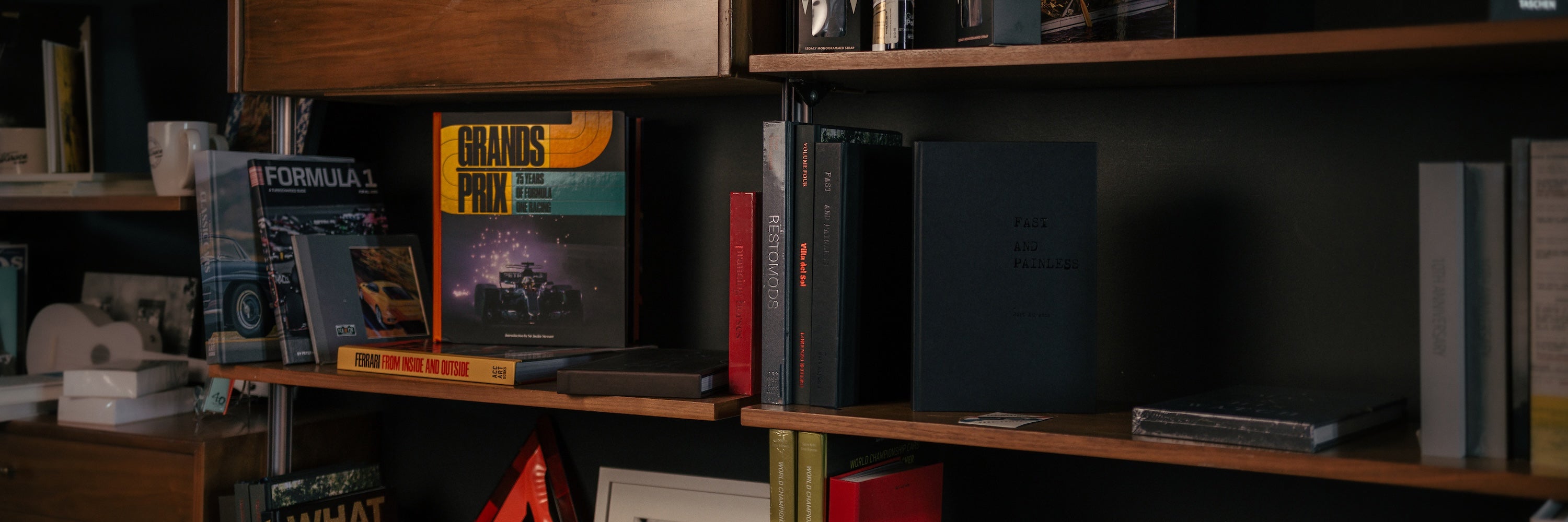 Car related books on bookshelf 