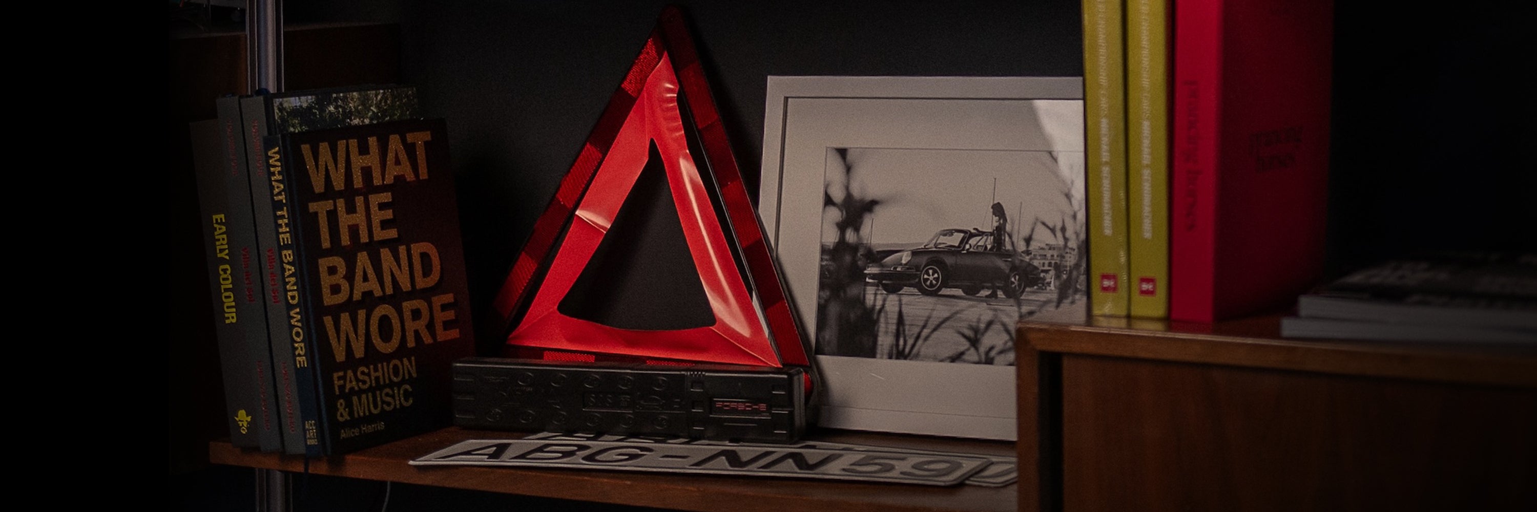Car Merch with books on shelf