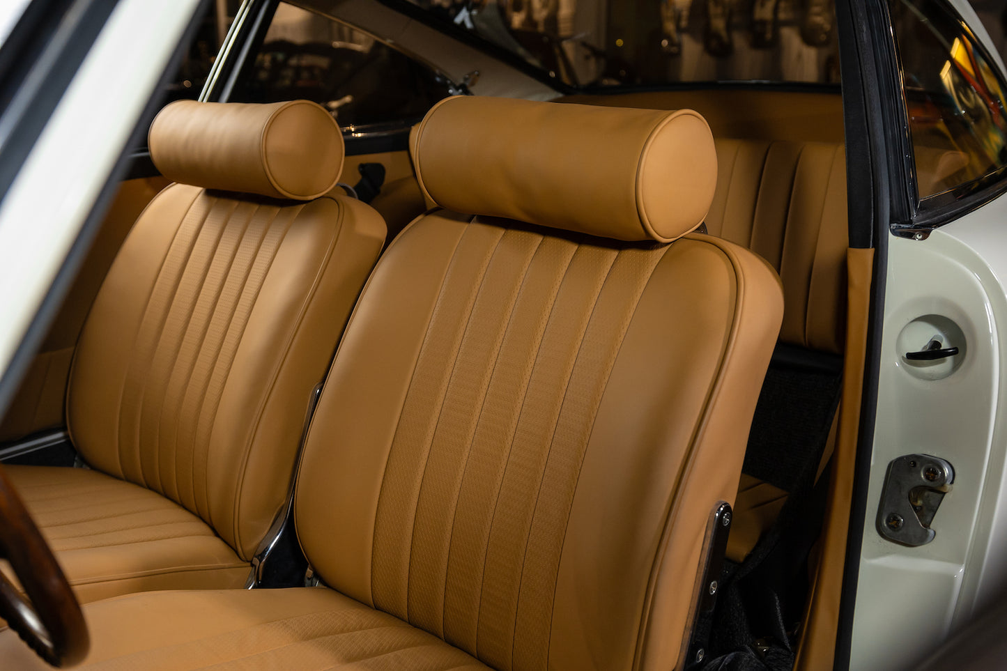 Brown car interior with headrests in a vehicle.