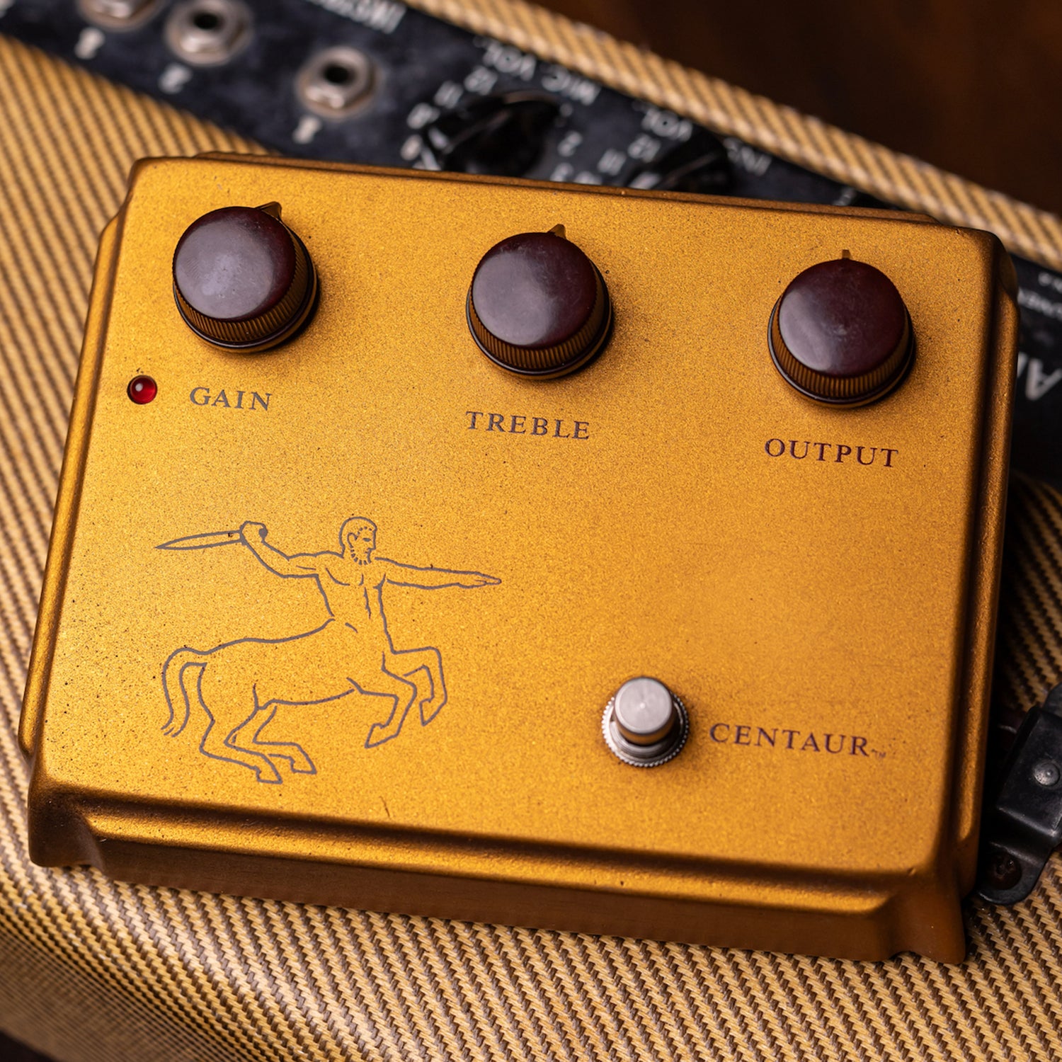 Klon Guitar Pedal on top of tweed amp
