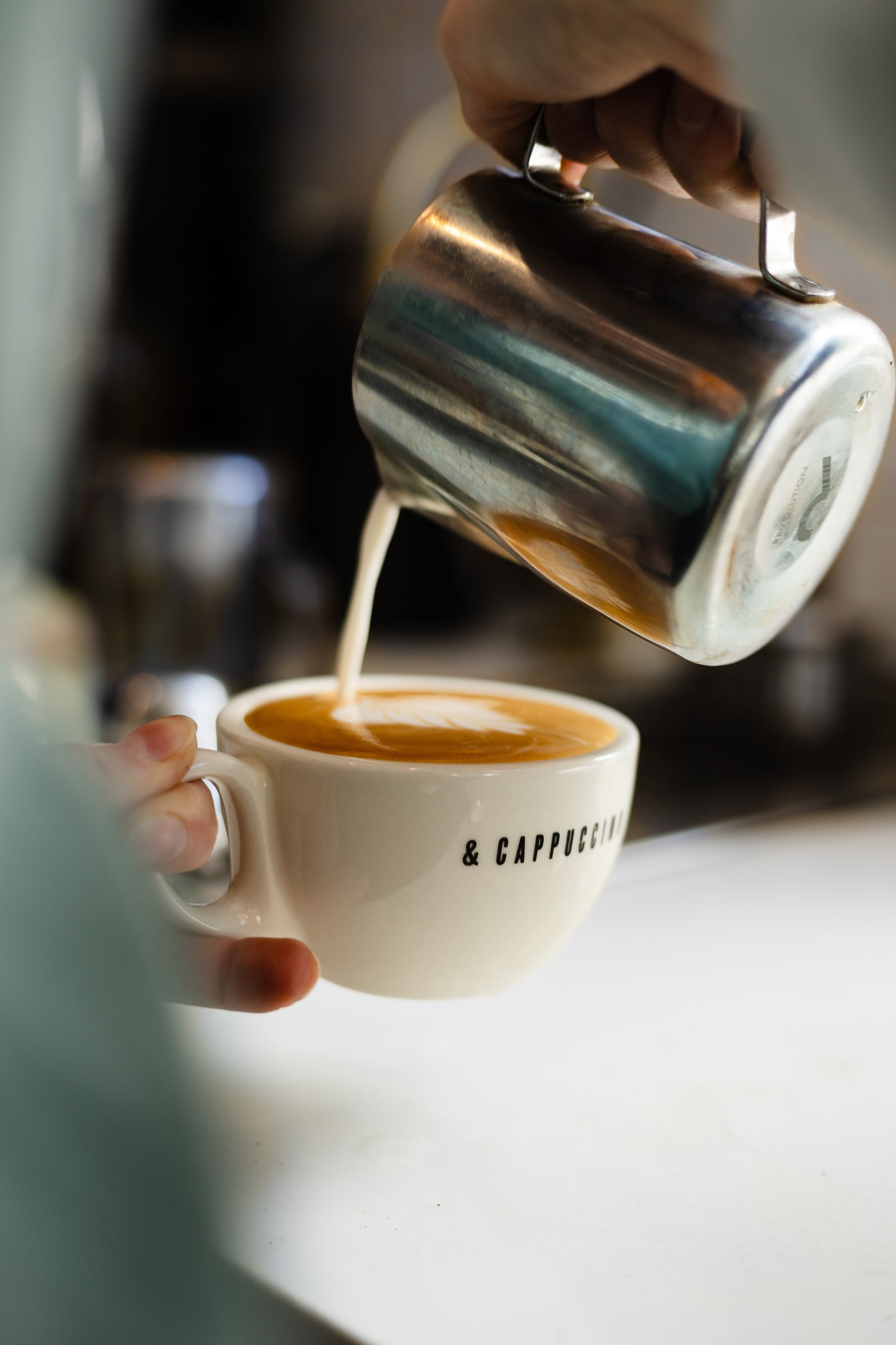 Serving coffee at Walt Grace Vintage